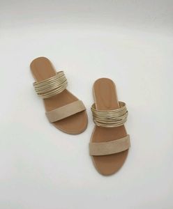 Tan And Gold Flat Sandals.