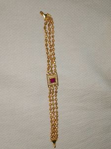 Elegant Gold and Pink Stone Bracelet