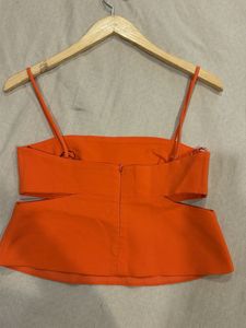 Vibrant Orange Cut-Out Top with pants