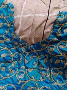 Designer Blue Embroidered Blouse  has margin