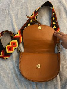 Stylish Brown Crossbody Bag with Embellished Strap