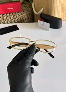 Prada Gold Frame Eyeglasses