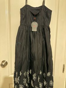 Chic Black Midi Dress with Floral Detail
