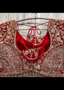Stunning Red Embellished Lehenga Choli