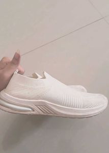 White Slip-On Knit Sneakers