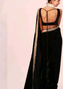 Elegant Black Saree with Gold Border
