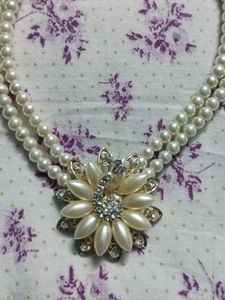 Expensive Peacock style Pearl necklace