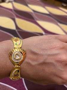 Elegant Gold Bracelet with Stones