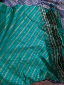 Elegant Teal Saree with Gold Border