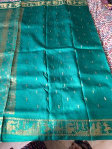 Beautiful Teal Saree with Gold Border