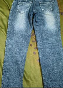 Stylish Blue Wash Jeans with Unique Detailing