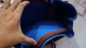 Charming Burgundy Handbag with Floral Embellishmen