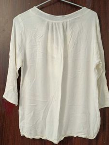 Elegant Embroidered Tassel Top