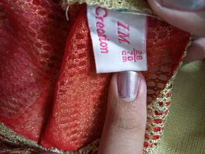 Elegant Beige Kurta with Red Accents