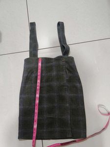 checked skirt with belt