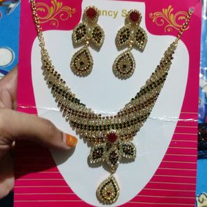 fancy set of necklace and pair of earring