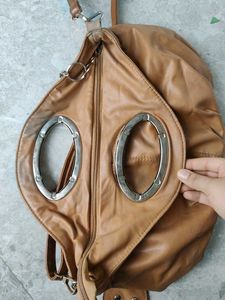 Chic Tan Leather Shoulder Bag with Flower Detail