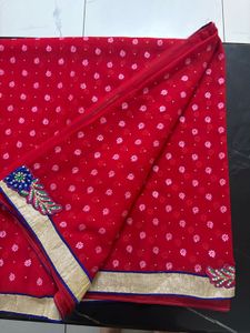 Vibrant Red Saree with Floral Embroidery