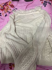 Cozy Knit Sweater with Fringe Detail