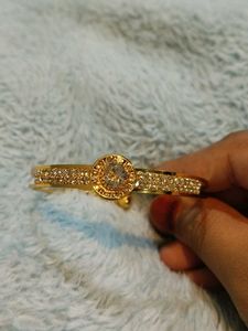 Elegant Gold Tone Bangle Bracelet with CZ Stones