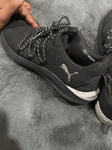 women’s Black Athletic Sneakers and lower