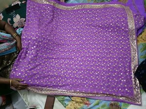 Purple Saree with Gold Embellishments