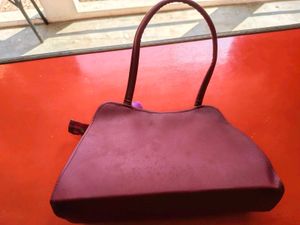Quilted Handbag with Embellishments