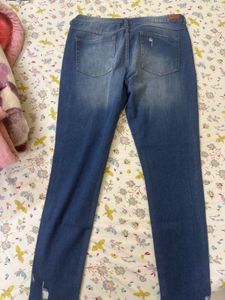 Distressed Denim Jeans
