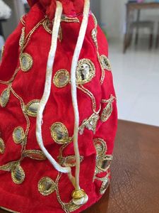 Red Potli Bag with Gold Embellishments