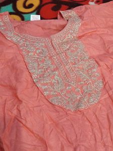 Elegant Peach Kurta with Embellished Neckline