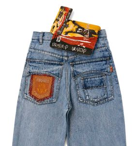 Y2K Light Wash Flare Jeans with Dhoom 2 Back Poc