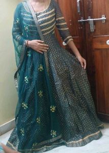 Elegant Teal Kurta Set with Golden Embellishments