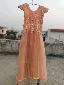 Peach Embroidered Net Lehenga Choli