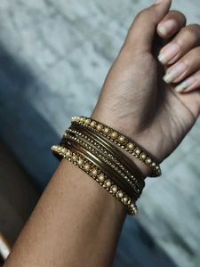 Elegant Pearl & Gold Bangles Set