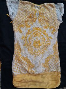 yellow top with net work, size xxs-xs