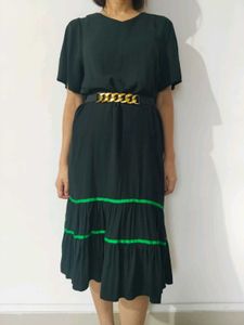 Chic Black Tiered Dress with Gold Chain Belt