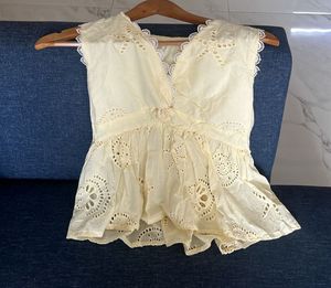 Charming Eyelet Peplum Top