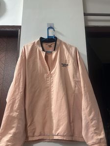 Reebok light orange gym wear Jacket