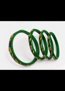Elegant Green Bangles with Gold Detailing