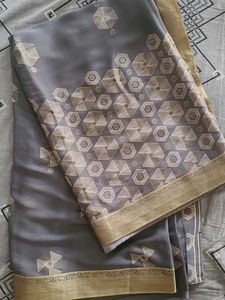Elegant Grey Saree with Gold Border
