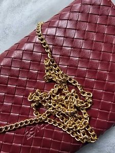Estee Lauder Woven Clutch with Gold Chain