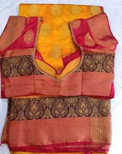 Vibrant Yellow Saree with Brocade Blouse
