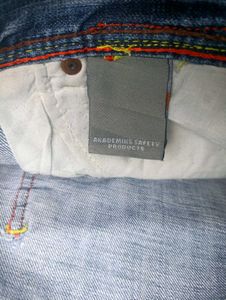 Stylish Blue Denim Jeans with Yellow Accents