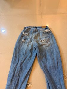 Distressed Blue Denim Jeans
