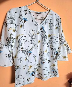 White Top With Ruffled Sleeves