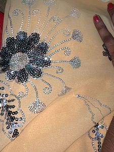 Elegant Peach Embroidered Saree