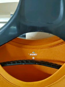 Orange Sleeveless Top with Graphic Print