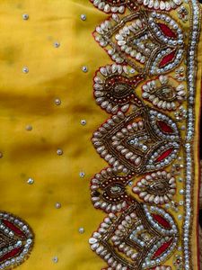 Exquisite Yellow  heavy Embellished Saree