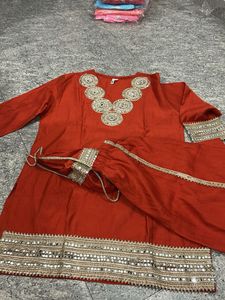 Red Embellished Kurta Set with Matching Potli Bag