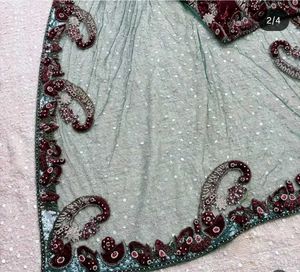 stunning net saree with velvet blouse